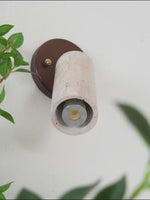 Load and play video in Gallery viewer, Cylindrical Travertine Wall Light
